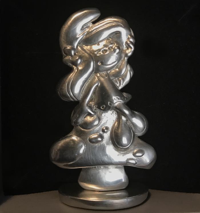 LES SCHTROUMPFS: LA SCHTROUMPFETTE SUR SON CHAMPIGNON - figurine en étain 5 cm