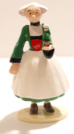 BECASSINE TENANT SA STATUETTE DANS LA MAIN