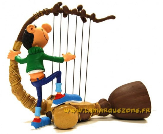 Gaston mit Bücherstapel. Sammelfigur. | Jetzt online bestellen bei Gaston mit Bücherstapel. Sammelfigur. | Jetzt online bestellen bei