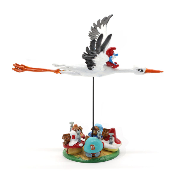 Figurine Pixi Les Schtroumpfs et la Cigogne survolant le village, collection Pixi Classique 2026 (05364)