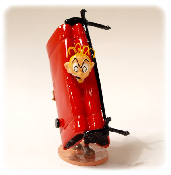 SPIROU: FANTASIO COINCE DANS SON CANAPE - figurine métal 10 cm