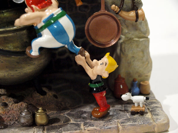 ASTERIX: COMMENT OBELIX EST TOMBE DANS LA MARMITE QUAND IL ETAIT PETIT - figurine métal 12 cm