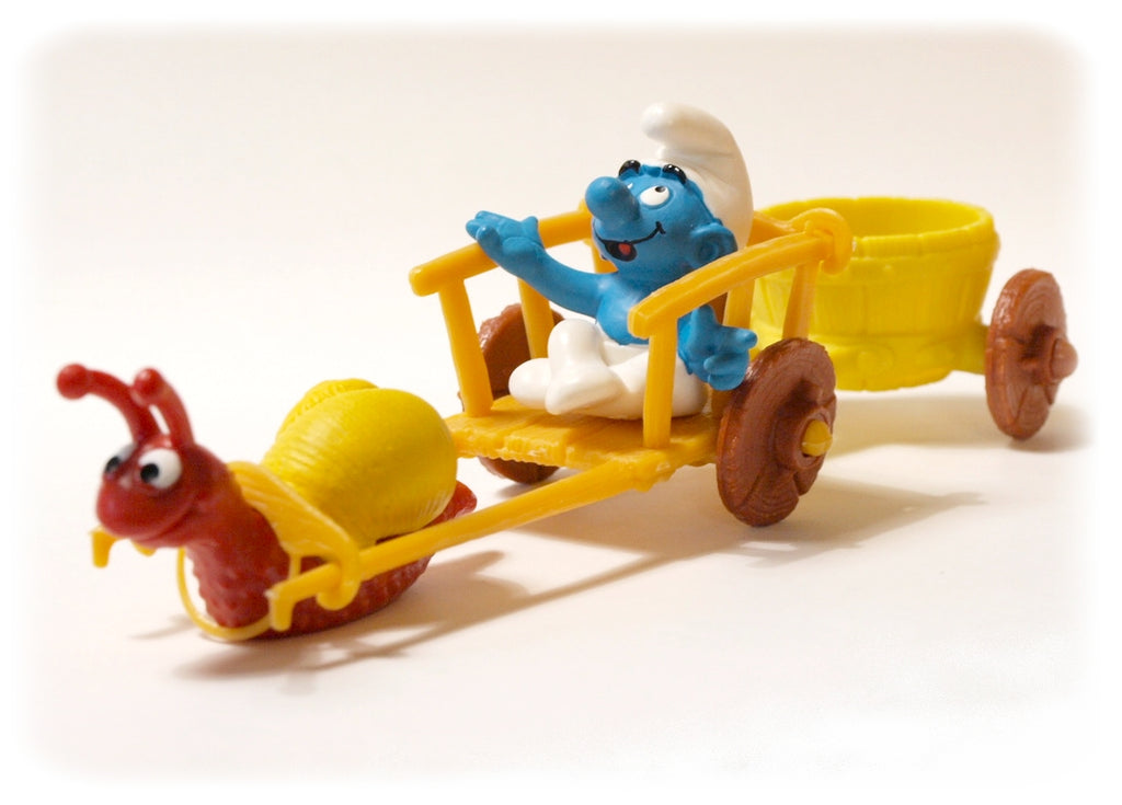 LES SCHTROUMPFS: SCHTROUMPF EN CHARRETTE AVEC L'ESCARGOT - figurine plastique 5 cm