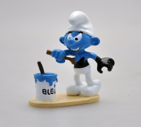 LES SCHTROUMPFS: LE SCHTROUMPF NOIR SE PEIGNANT EN BLEU, COLLECTION ORIGINE III - figurine métal