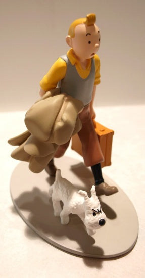 Tintin - 1 Figure - Statuette Moulinsart 47001 - Tintin assis dans l'herbe - L'île noire - 2022 Tintin - 1 Figure - Statuette Moulinsart 47001 - Tintin assis dans l'herbe - L'île noire - 2022