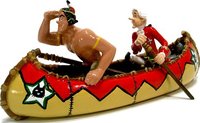 OUMPAH-PAH & HUBERT DE LA PATE FEUILLETEE EN CANOE - figurine métal