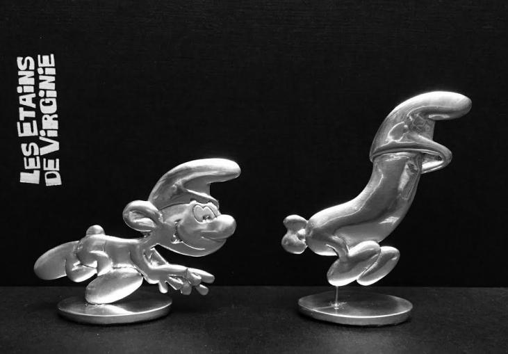 LES SCHTROUMPFS: LE SCHTROUMPF POURSUIVANT LA SAUCISSE - figurines en étain 6 cm