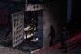 THE WALKING DEAD (TV): LOWER PRISON CELL & DECOMPOSING RIOT GEAR WALKER - jeu de construction + 1 figurine